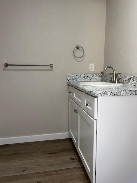 6135 Robin Road Crestview, FL 32539 - Photo 16 of 24 a bathroom with a granite countertop sink and a mirror