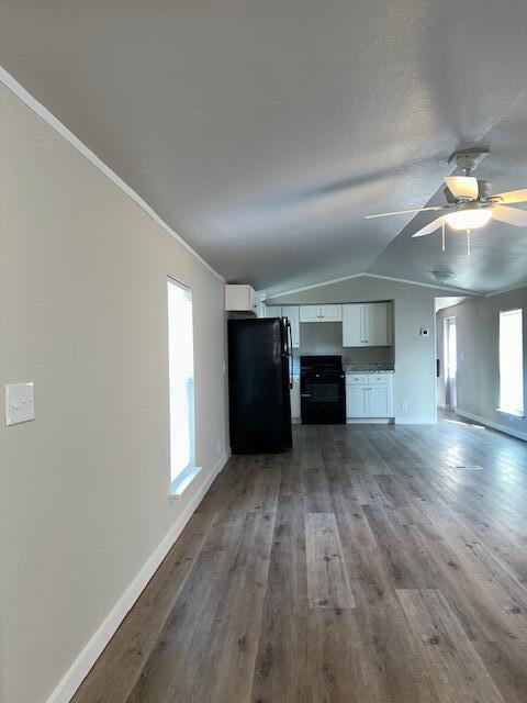 6135 Robin Road Crestview, FL 32539 - Photo 3 of 24 wooden floor in an empty room with a window