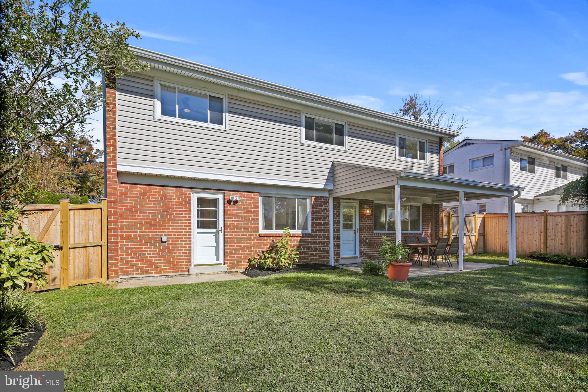 12910 Crisfield Road Silver Spring, MD 20906 - Photo 26 of 30 a front view of a house with garden