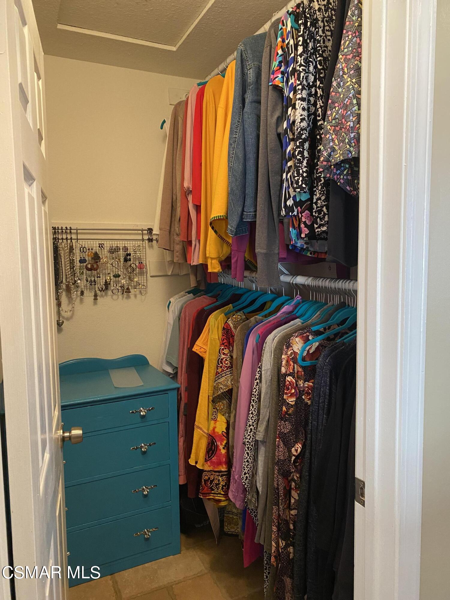 801 Congressional Road Simi Valley, CA 93065 - Photo 11 of 22 a view of walk in closet with clothes and shoes
