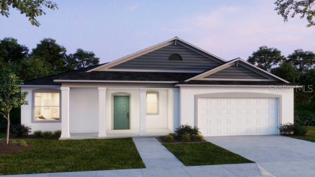 Tbd Mohawk Road Venice, FL 34293 - Photo 2 of 16 a front view of a house with a yard