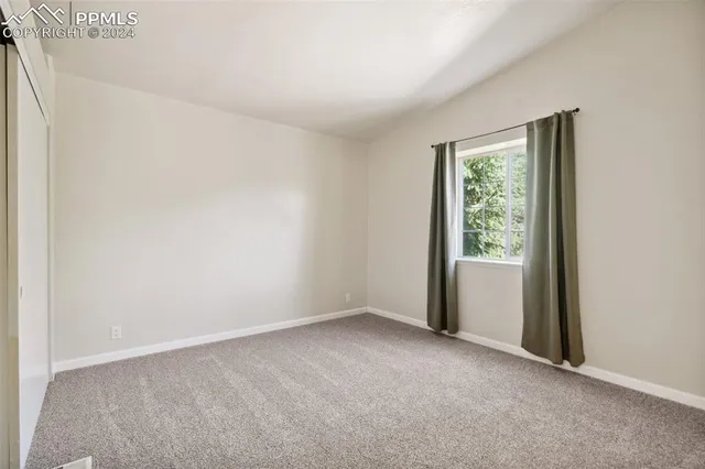 an empty room with a window