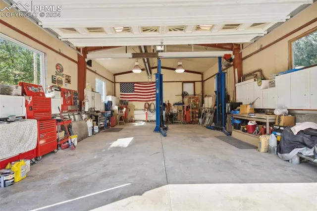 a view of a garage with storage