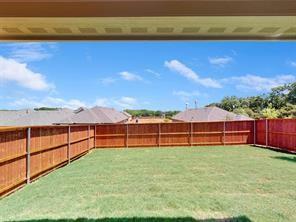 3421 Buster Way Corinth, TX 76210 - Photo 8 of 11 a view of a backyard