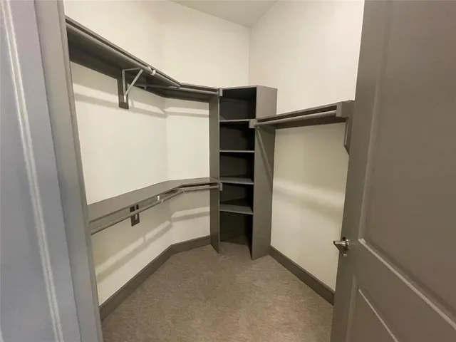 a bathroom with a tub and a shower