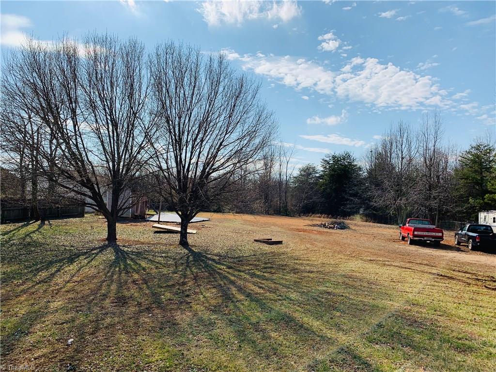 216 Price Mill Road Summerfield, NC 27358 - Photo 2 of 10 .83 level acre lot in Summerfield