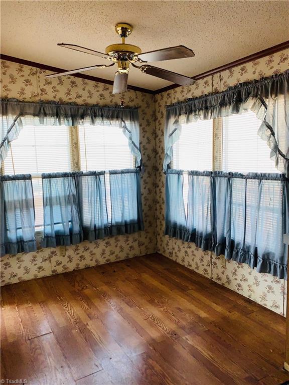 216 Price Mill Road Summerfield, NC 27358 - Photo 5 of 10 Breakfast area. Laundry area just inside side entrance