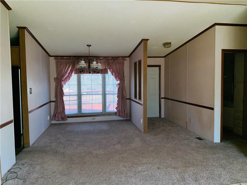 216 Price Mill Road Summerfield, NC 27358 - Photo 6 of 10 Front entrance and DR area