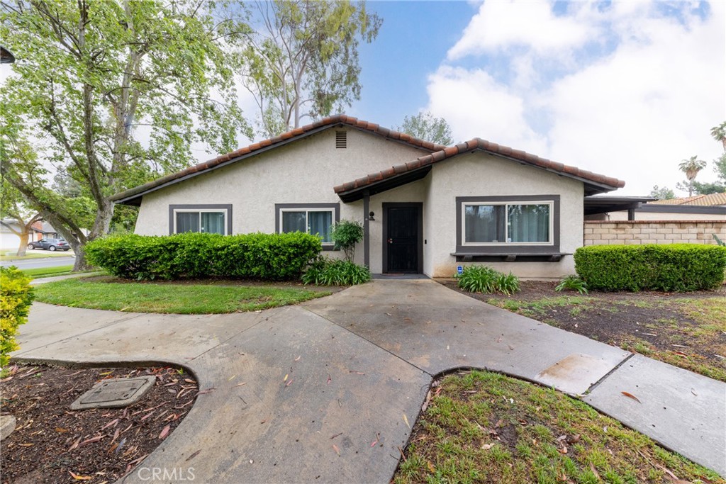 2760 Monroe Street Riverside, CA 92504 - Photo 1 of 21 a view of a house with a yard