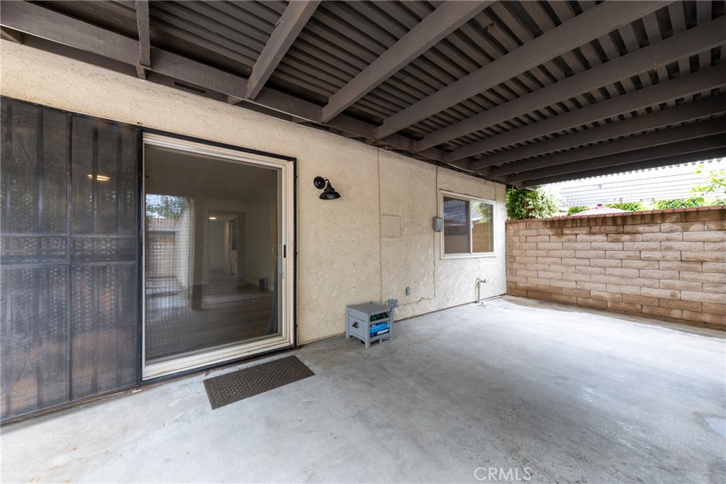 2760 Monroe Street Riverside, CA 92504 - Photo 19 of 21 a view of an empty room with wooden floor and a window