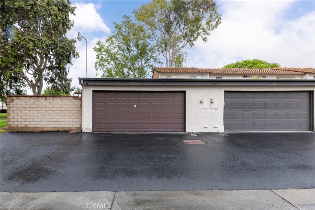 2760 Monroe Street Riverside, CA 92504 - Photo 4 of 21 a front view of a house with a garage