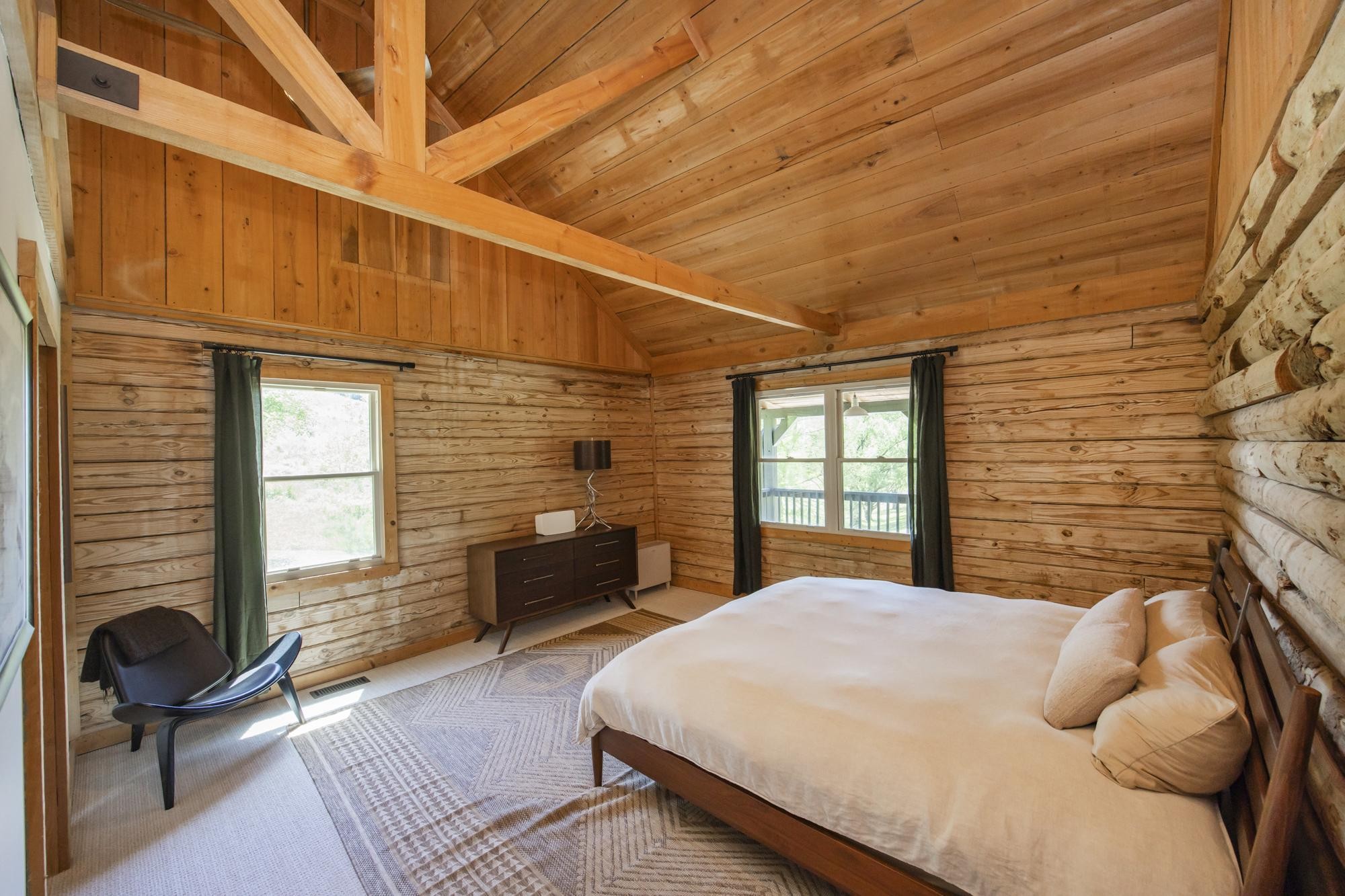 1370 Dog Branch Road Hartsville, TN 37074 - Photo 16 of 60 a bedroom with a bed and wooden floor