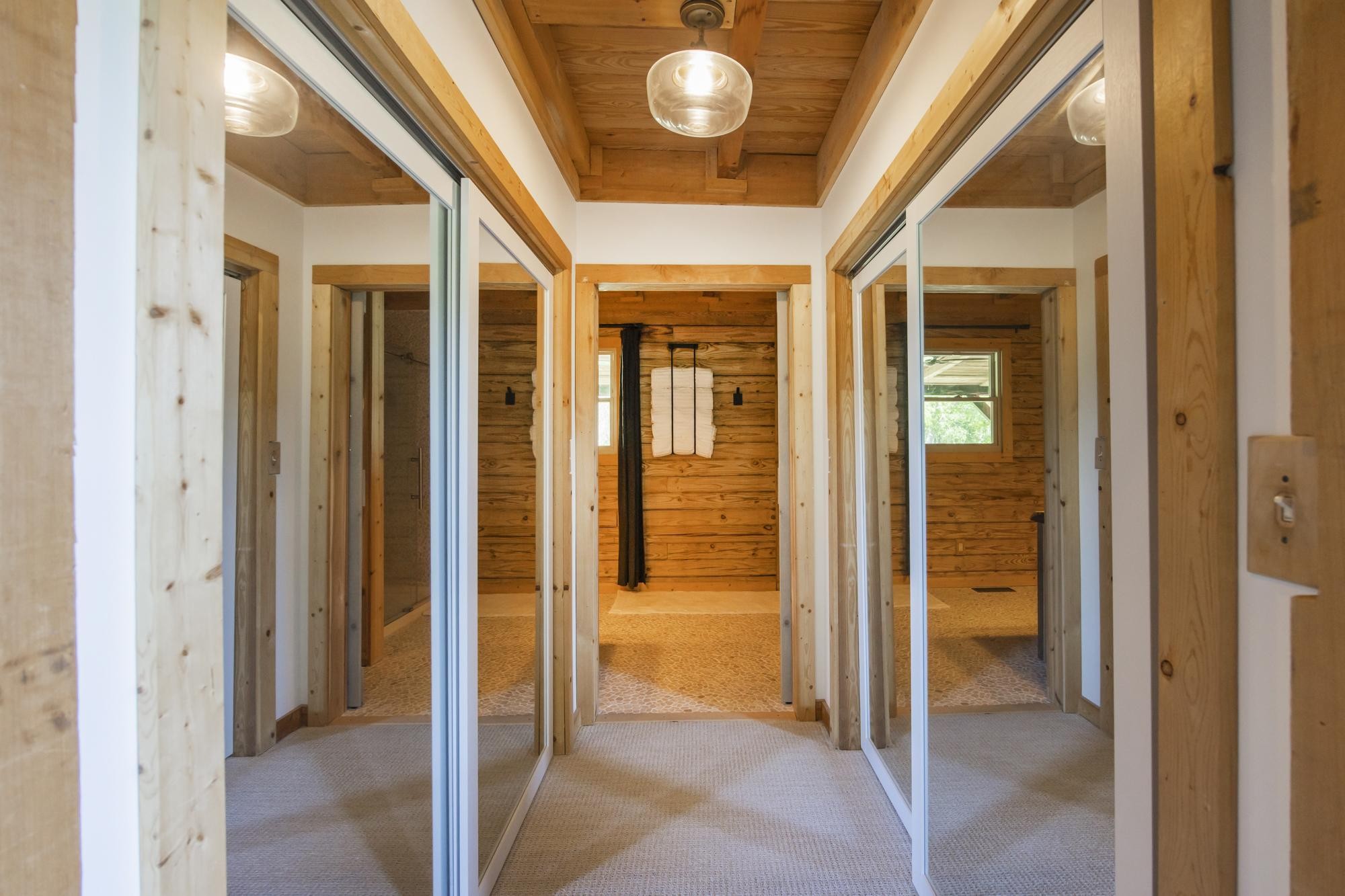 1370 Dog Branch Road Hartsville, TN 37074 - Photo 18 of 60 a view of a hallway with wooden floor and a bathroom
