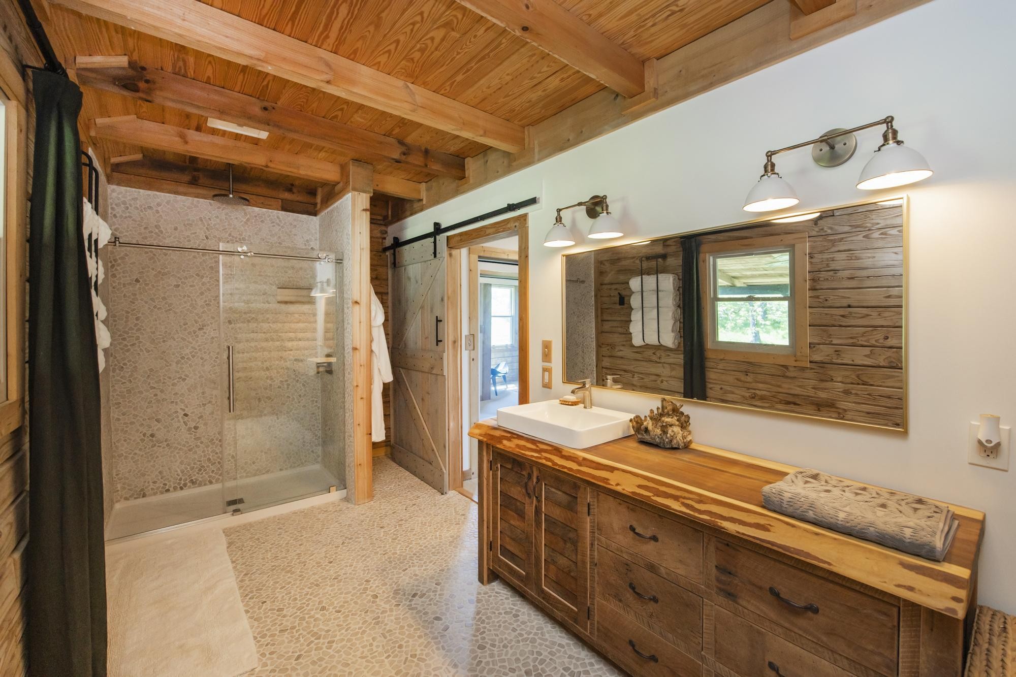 1370 Dog Branch Road Hartsville, TN 37074 - Photo 20 of 60 a bathroom with a double vanity sink and large mirror