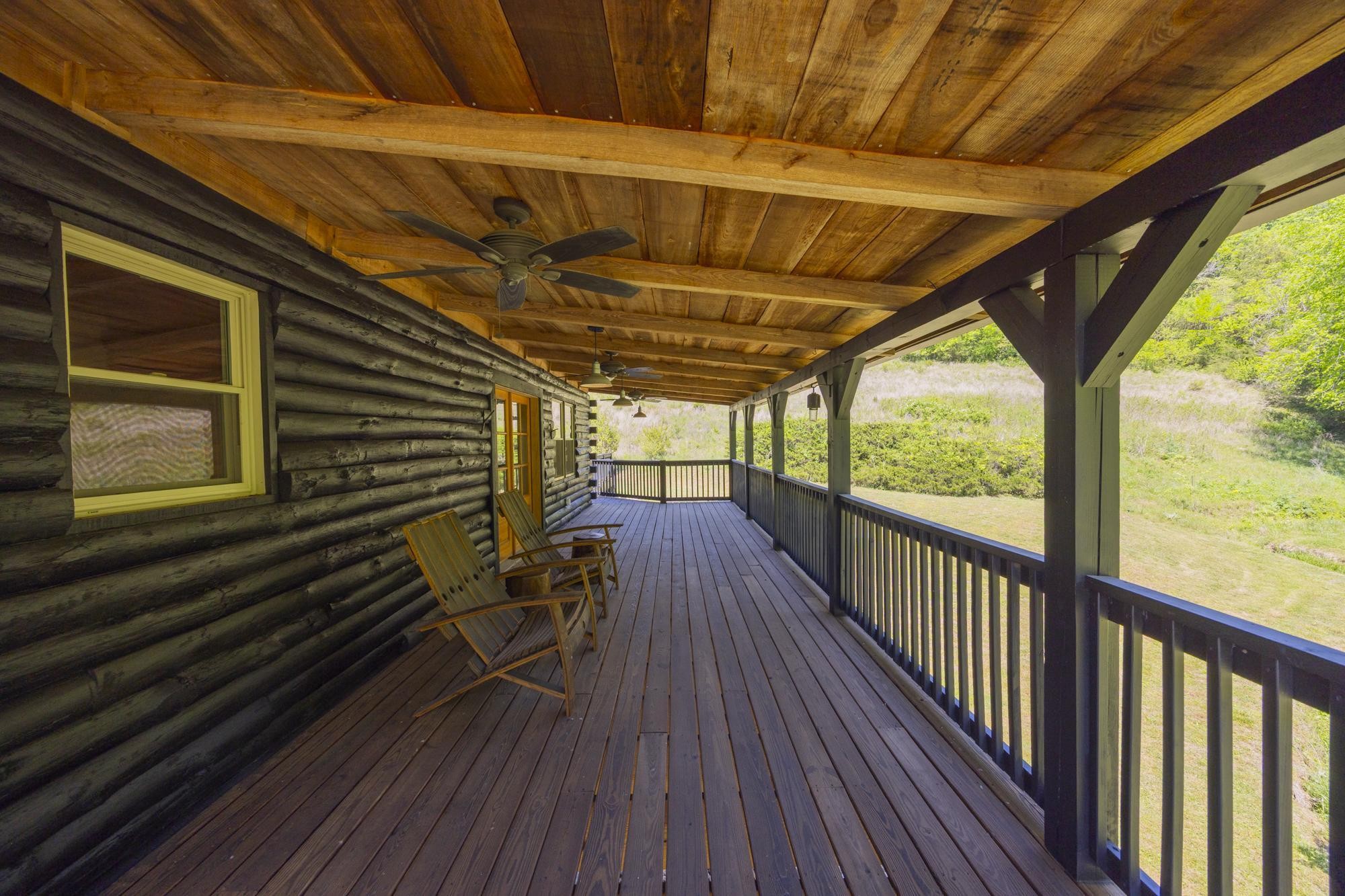 1370 Dog Branch Road Hartsville, TN 37074 - Photo 24 of 60 a view of a balcony with wooden floor