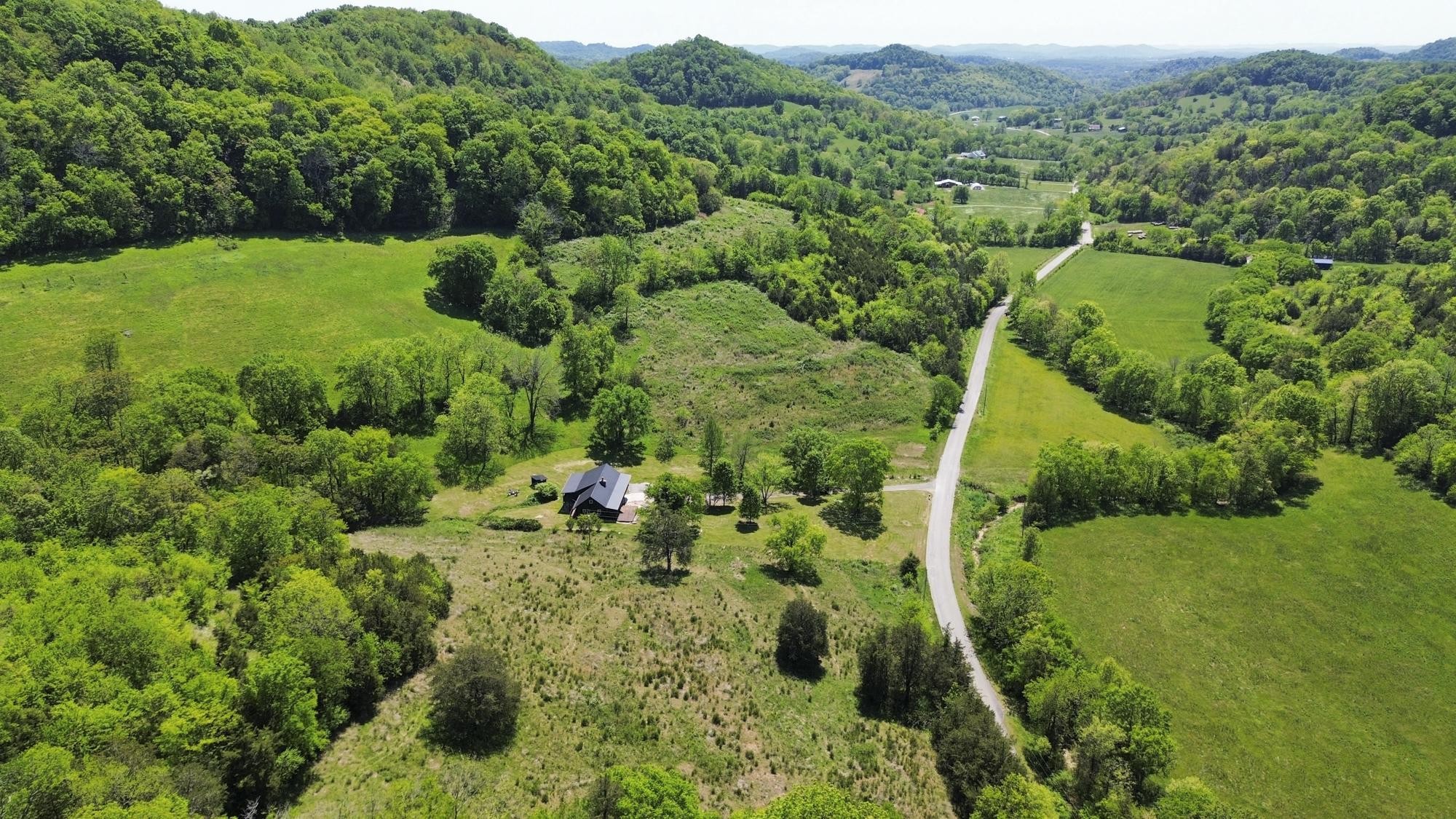 1370 Dog Branch Road Hartsville, TN 37074 - Photo 47 of 60 an aerial view of residential house with outdoor space and trees all around