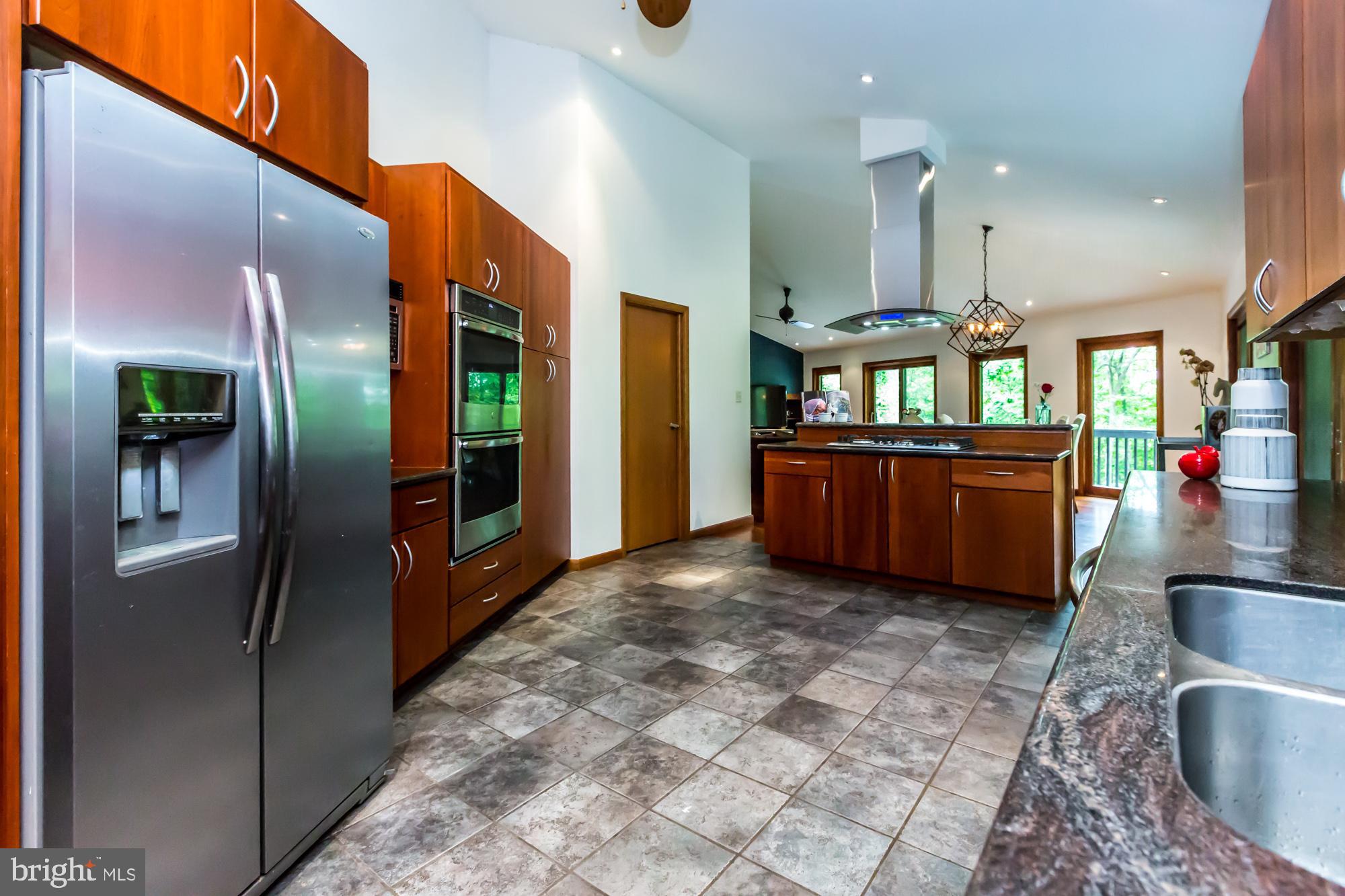 27 Hunt Hill Road Spring City, PA 19475 - Photo 8 of 33 Kitchen with tile floor, custom cabinets