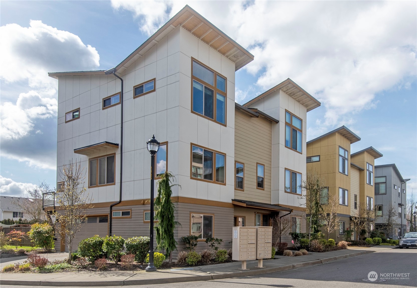 4525 Northeast 3rd Lane Renton, WA 98059 - Photo 1 of 26 a front view of a building with street