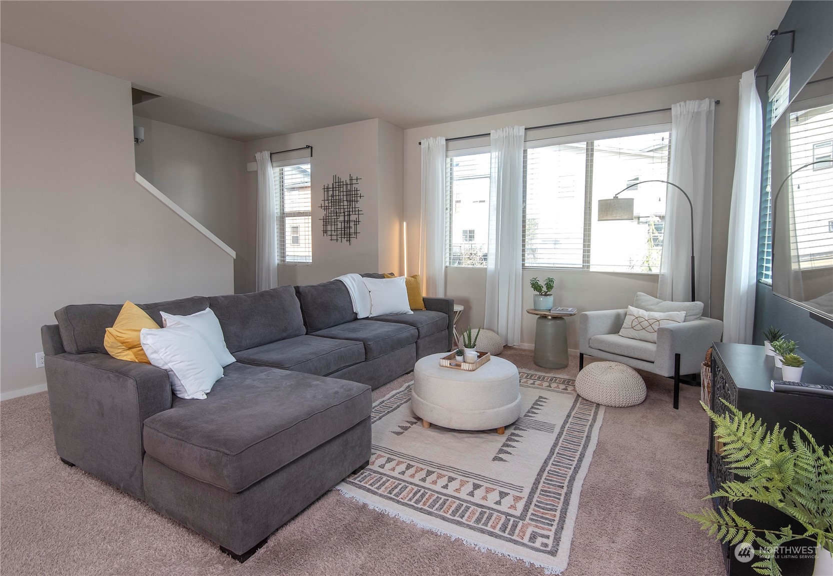 4525 Northeast 3rd Lane Renton, WA 98059 - Photo 11 of 26 a living room with furniture and a large window