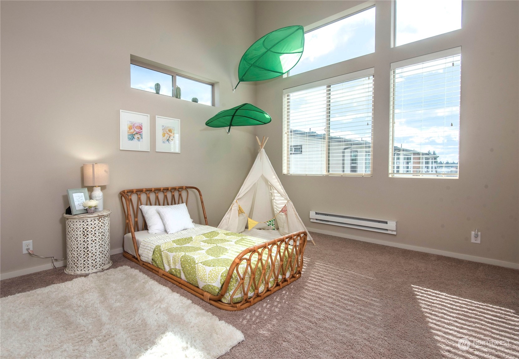 4525 Northeast 3rd Lane Renton, WA 98059 - Photo 18 of 26 a bed room with a bed and a window