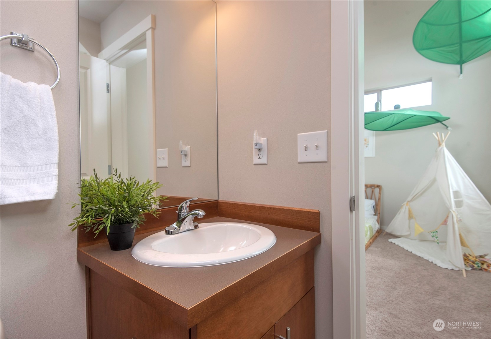 4525 Northeast 3rd Lane Renton, WA 98059 - Photo 21 of 26 a bathroom with a sink and a mirror