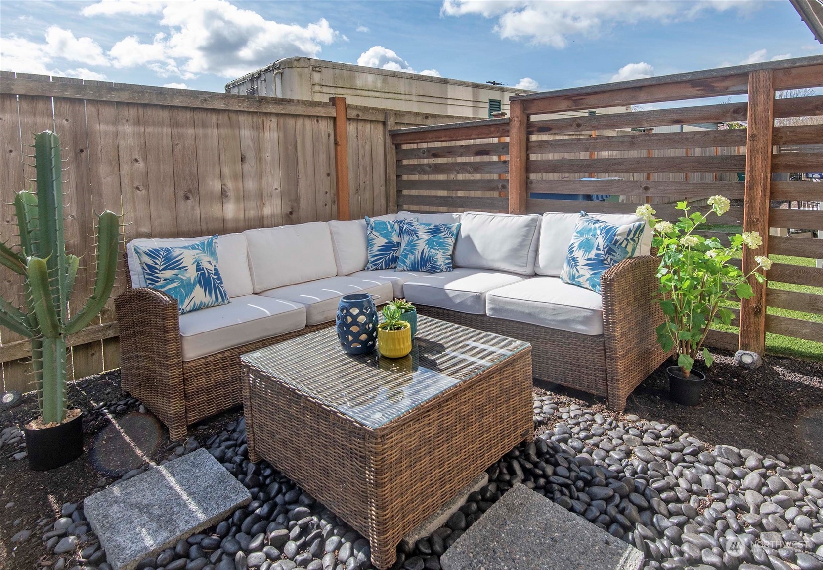 4525 Northeast 3rd Lane Renton, WA 98059 - Photo 25 of 26 a view of a patio with couches and a potted plant on the floor