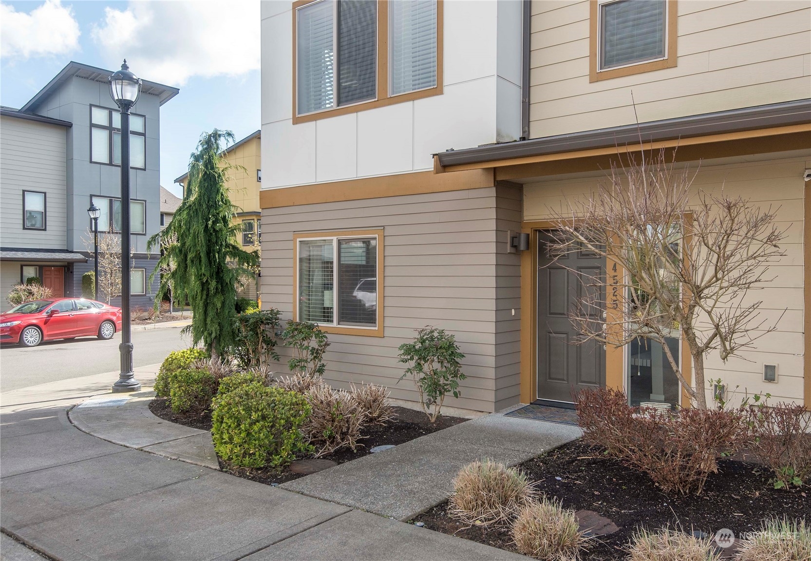 4525 Northeast 3rd Lane Renton, WA 98059 - Photo 4 of 26 a view of a house with a yard