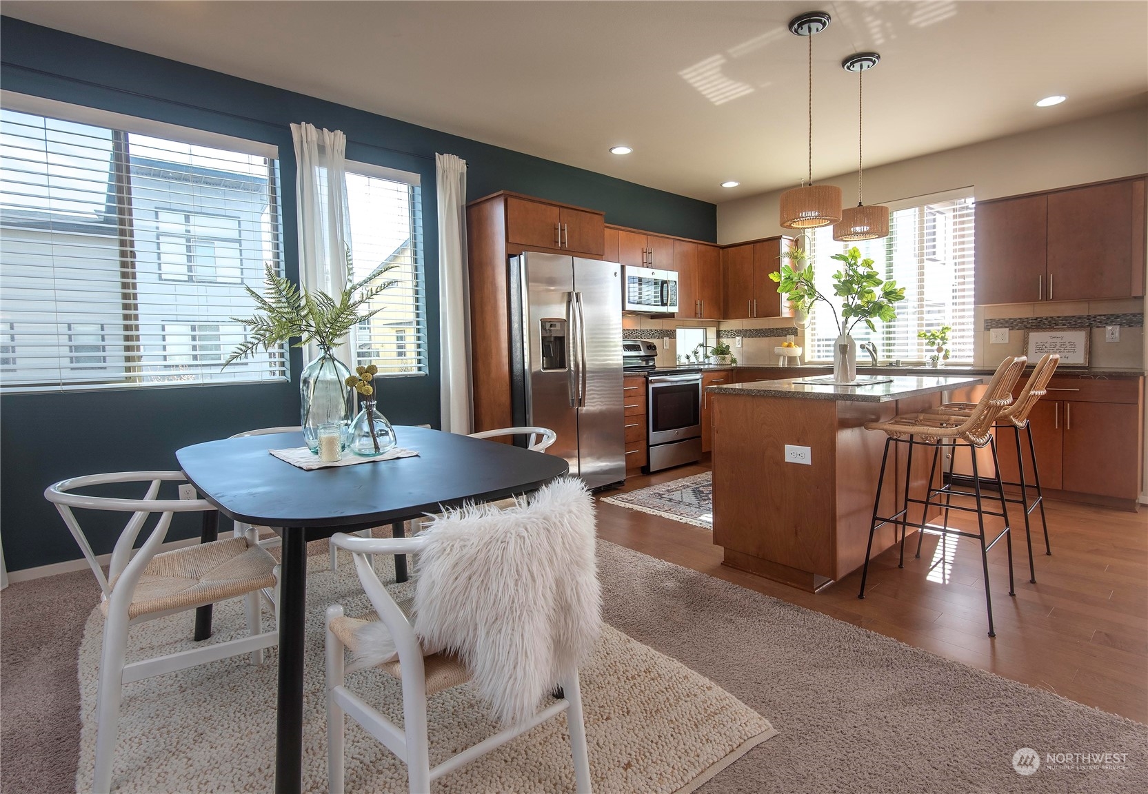 4525 Northeast 3rd Lane Renton, WA 98059 - Photo 5 of 26 a view of a dining room with furniture window and wooden floor