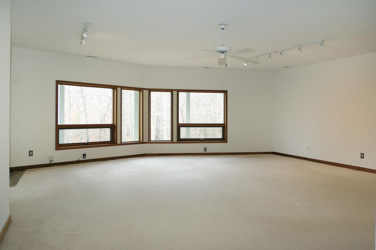 1249 Jordan Hills Loop Chapel Hill, NC 27517 - Photo 15 of 42 an empty room with windows and view