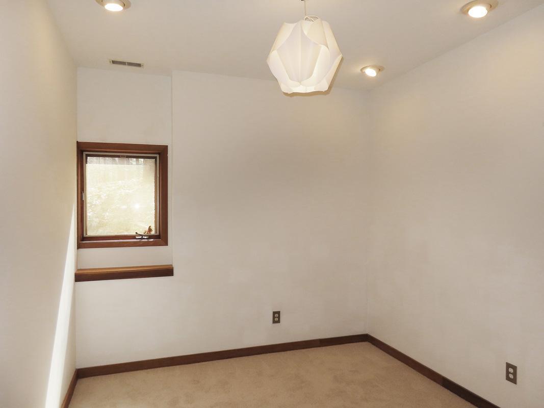 1249 Jordan Hills Loop Chapel Hill, NC 27517 - Photo 23 of 42 a view of a small space with wooden floor and a window