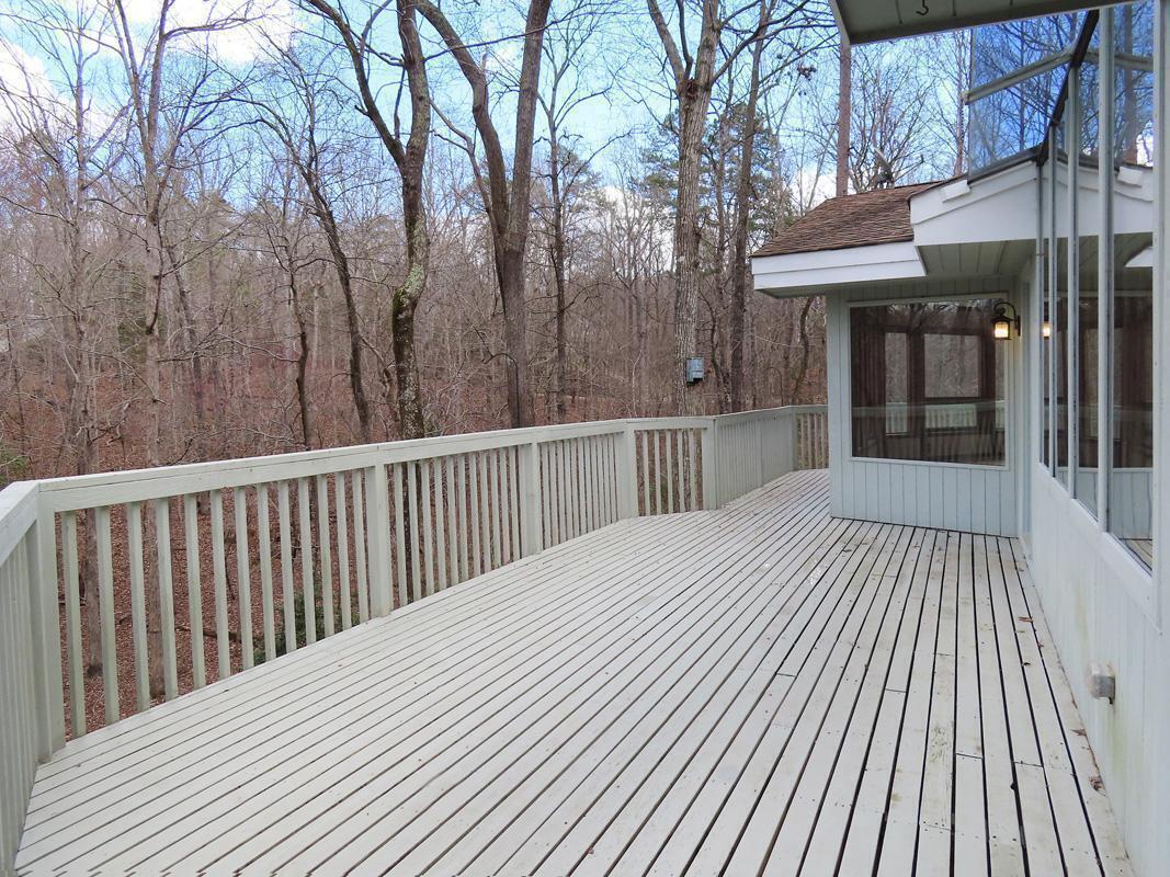 1249 Jordan Hills Loop Chapel Hill, NC 27517 - Photo 29 of 42 a view of a wooden deck
