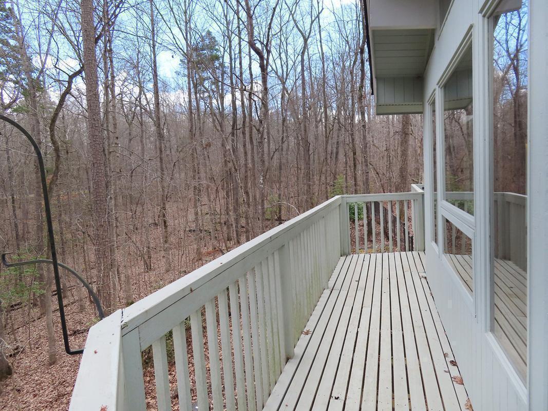 1249 Jordan Hills Loop Chapel Hill, NC 27517 - Photo 32 of 42 a view of balcony with wooden floor