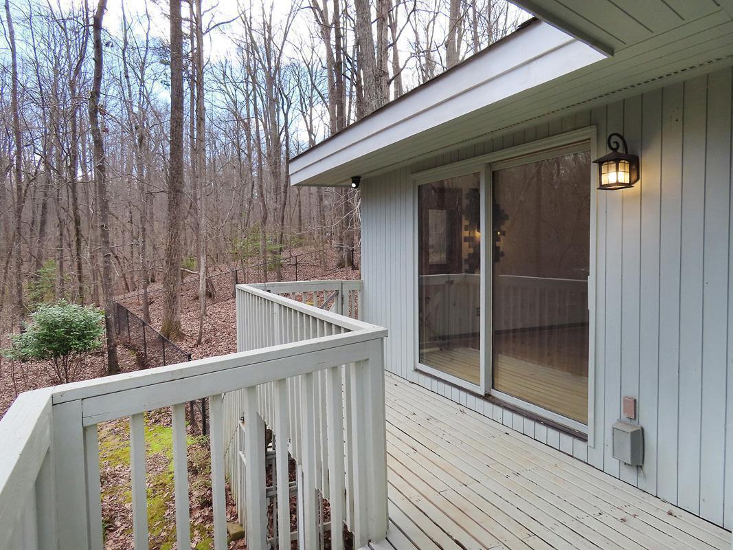 1249 Jordan Hills Loop Chapel Hill, NC 27517 - Photo 33 of 42 a view of wooden balcony
