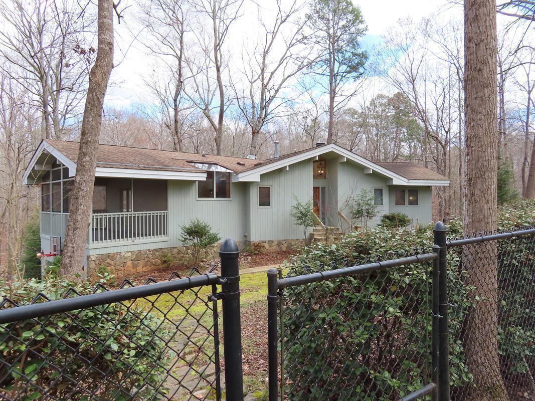 1249 Jordan Hills Loop Chapel Hill, NC 27517 - Photo 42 of 42 a view of house with trees in the background