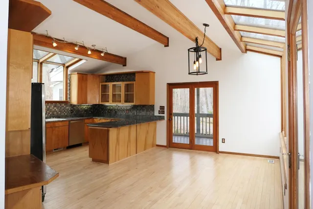 a front view of a house with yard