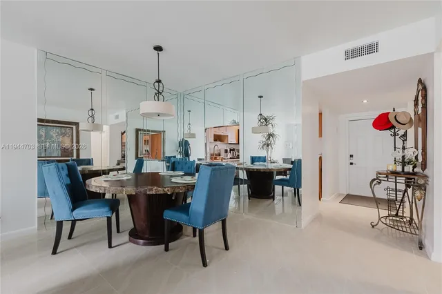 a view of a dining room with furniture