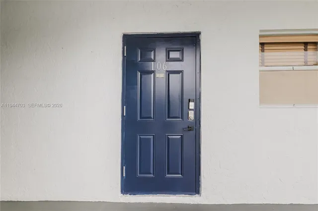 a view of a balcony with chairs