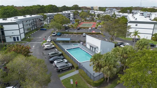 an aerial view of a city with lake view