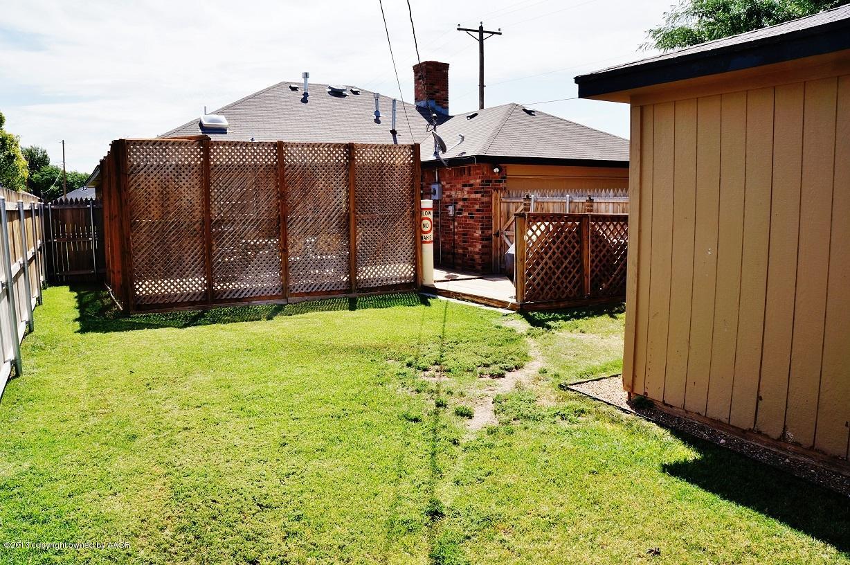 8012 Claret Street Amarillo, TX 79110 - Photo 25 of 25 a view of a back yard of the house