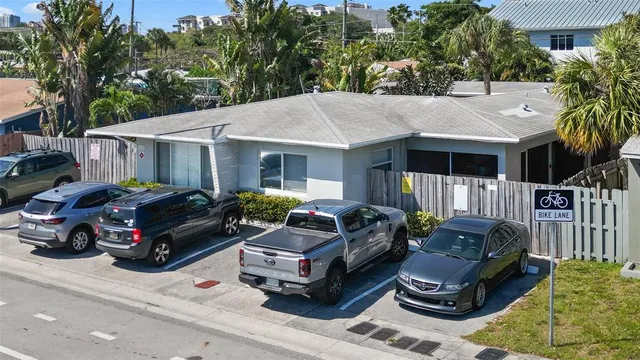 a car parked in front of a house