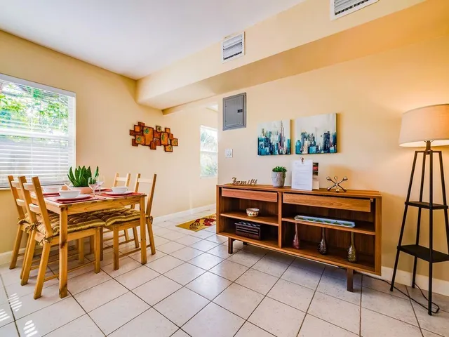 a view of a workspace with furniture