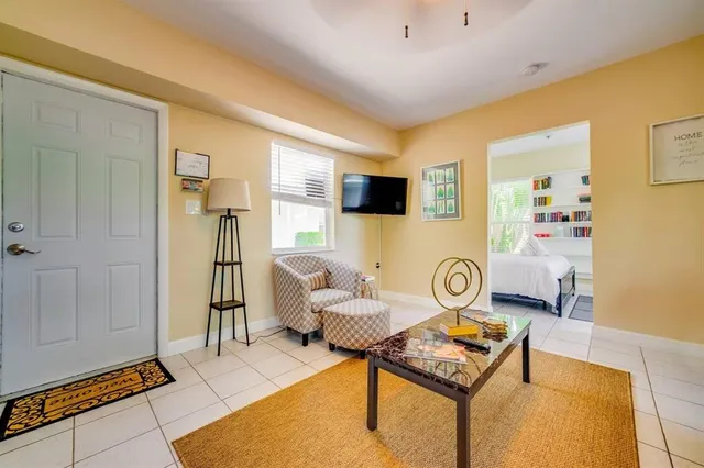 a living room with furniture and a table