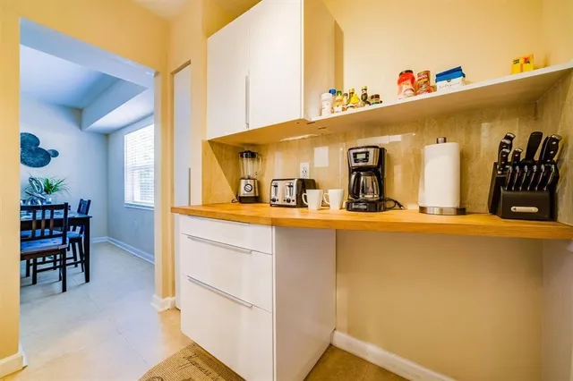 a view of living room with furniture and window