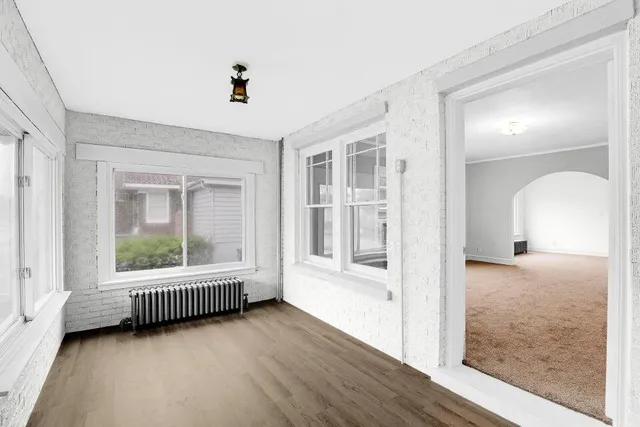 an empty room with windows