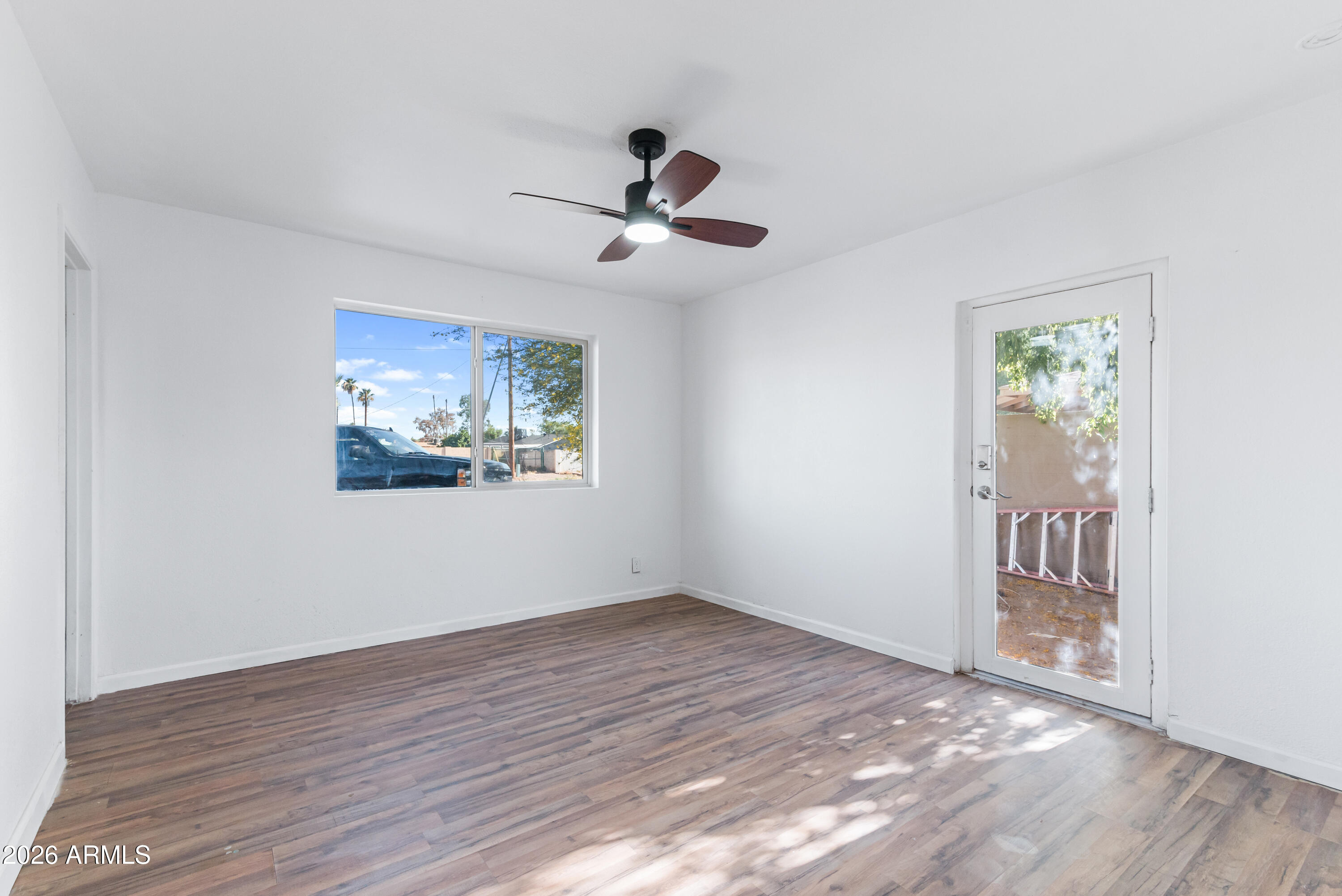 860 West McLellan Road Mesa, AZ 85201 - Photo 14 of 26 a view of empty room with wooden floor