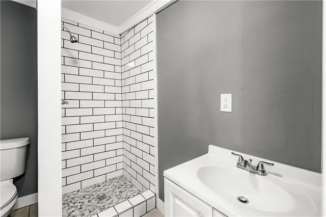 a bathroom with a sink and mirror