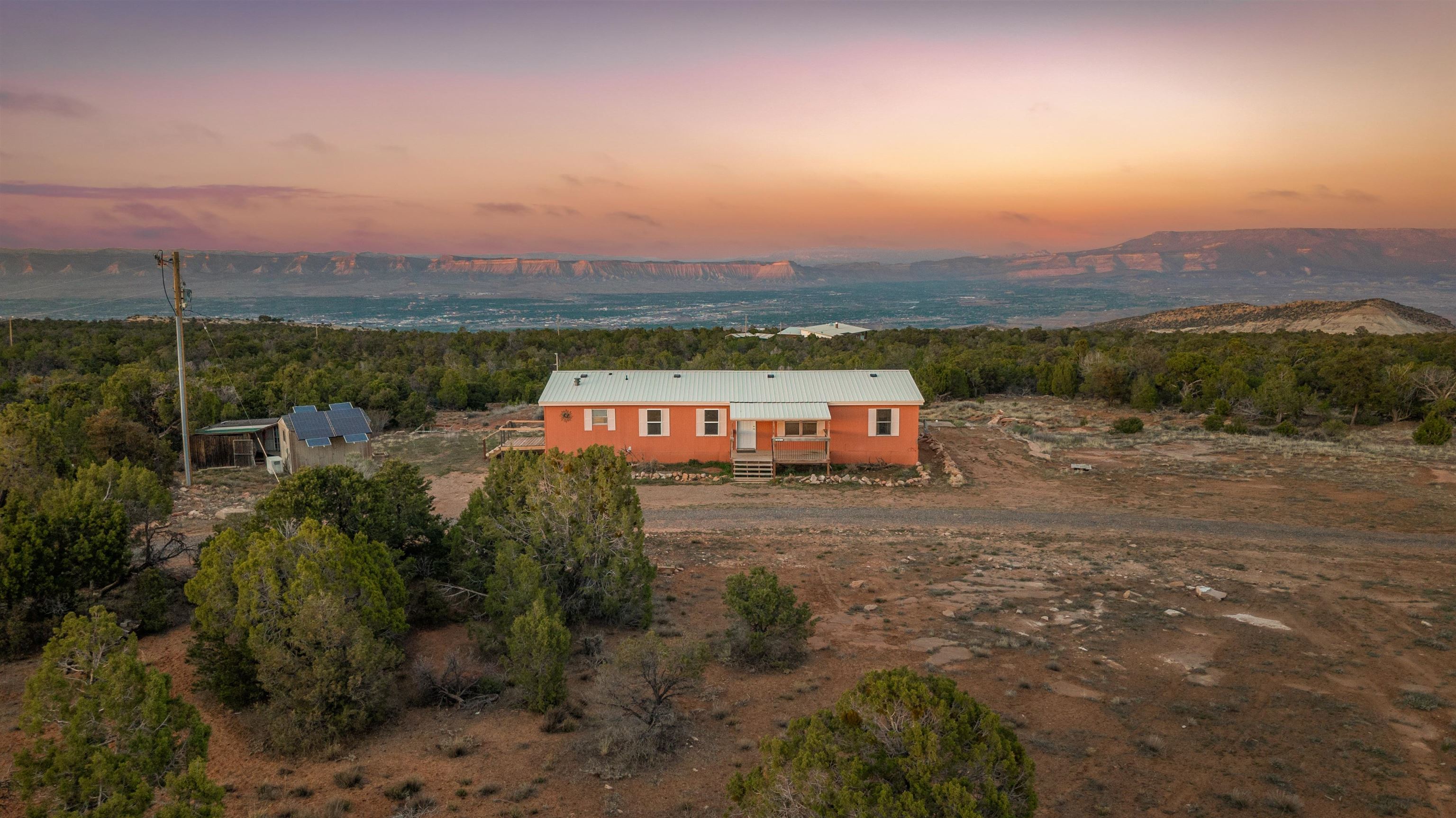 21431 Little Park Road Grand Junction, CO 81507 - Photo 2 of 40 an aerial view of a house with a yard