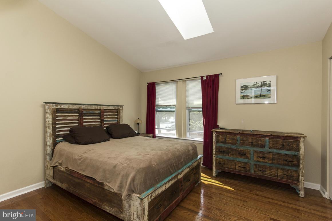 928 South Paca Street Baltimore, MD 21230 - Photo 11 of 23 Back bedroom has vaulted ceilings