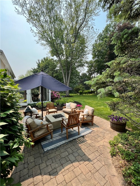 65 Jackson Rd Extension Penfield, NY 14526 - Photo 16 of 48 Backyard Patio