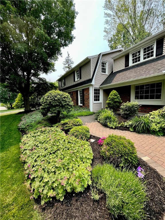 65 Jackson Rd Extension Penfield, NY 14526 - Photo 4 of 48 Walkway and gardens in front